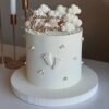 White theme cake for baby